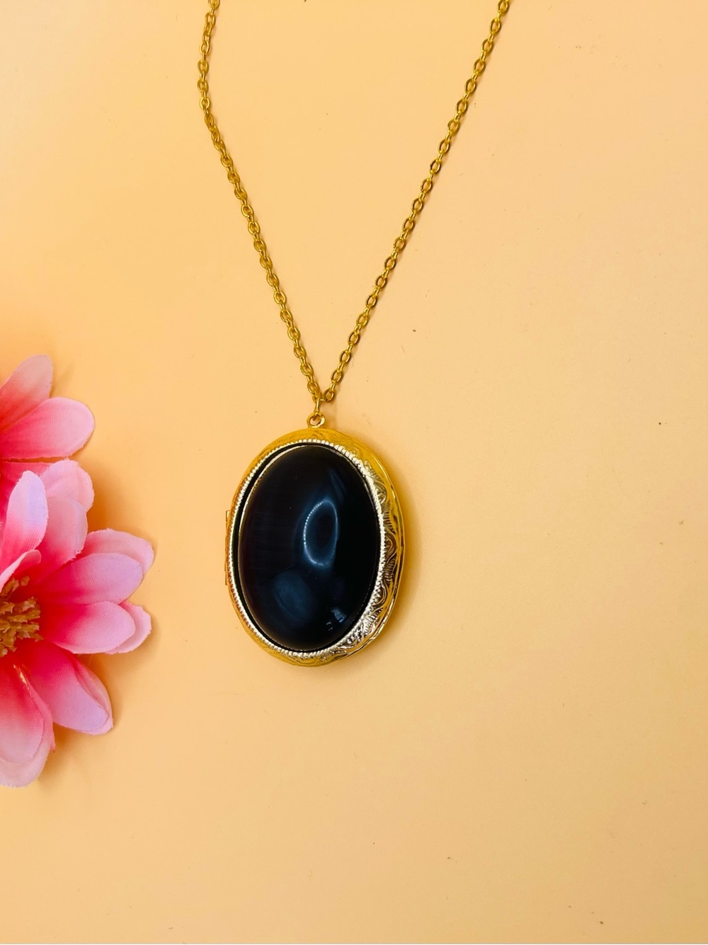 Black oval stone locket pendant necklace